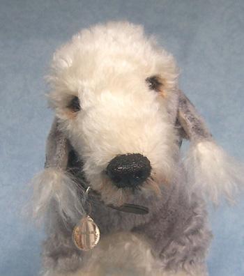 https://images.dog.ceo/breeds/terrier-bedlington/n02093647_2321.jpg